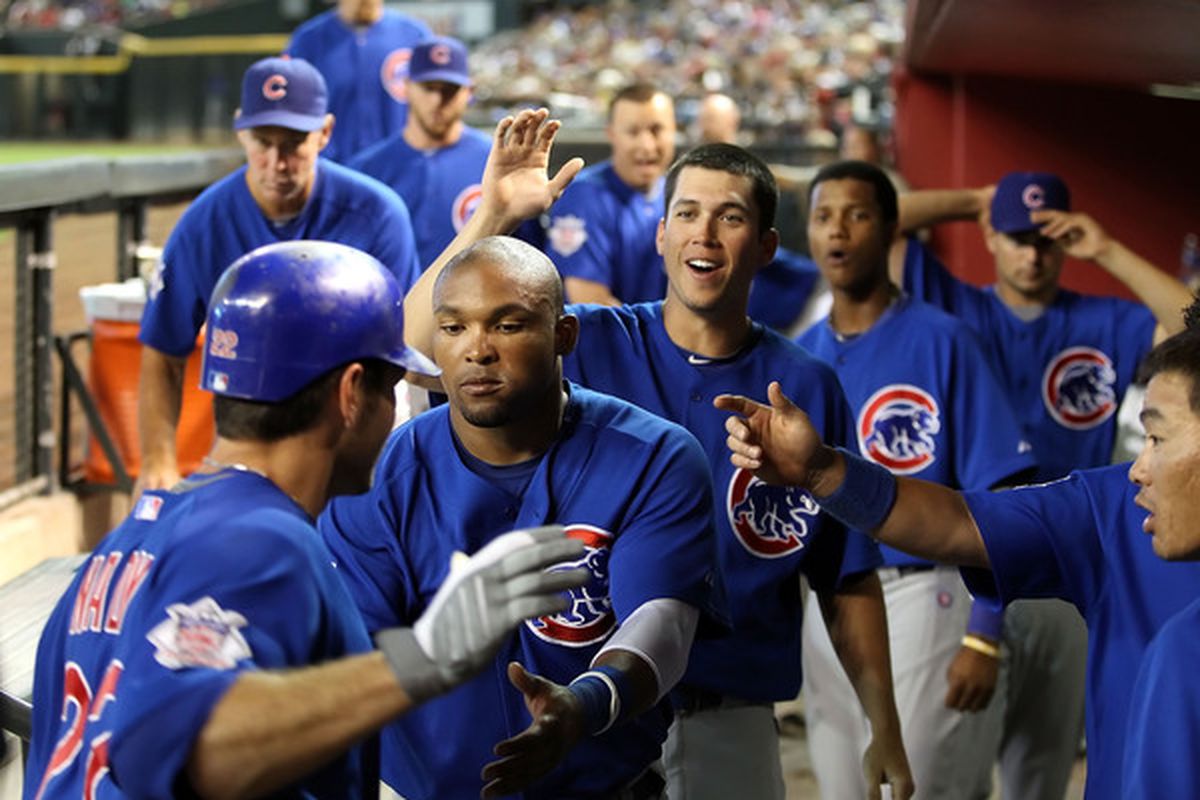 A rare sight: a happy Cubs dugout.