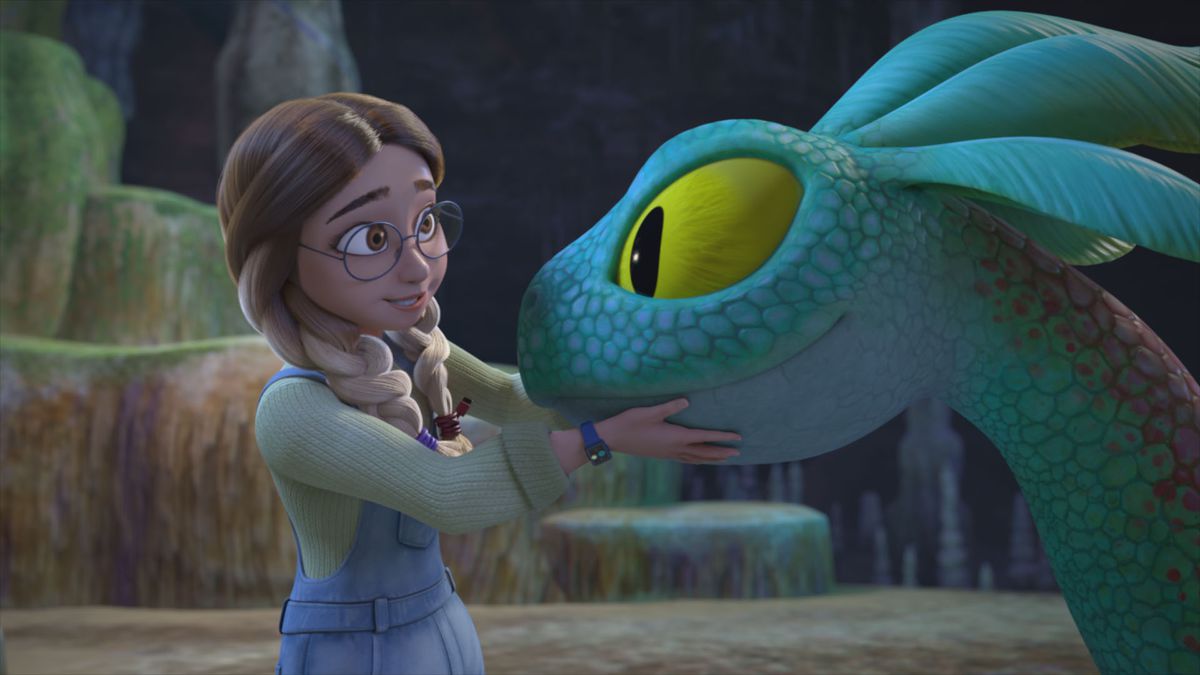 a girl with braids gently holding the head of a big-eyed turquoise dragon 