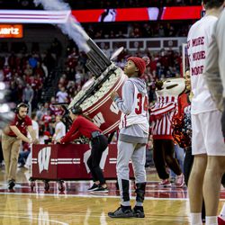 Jerell Moore watches the t-shirt cannon at work during a media timeout. 