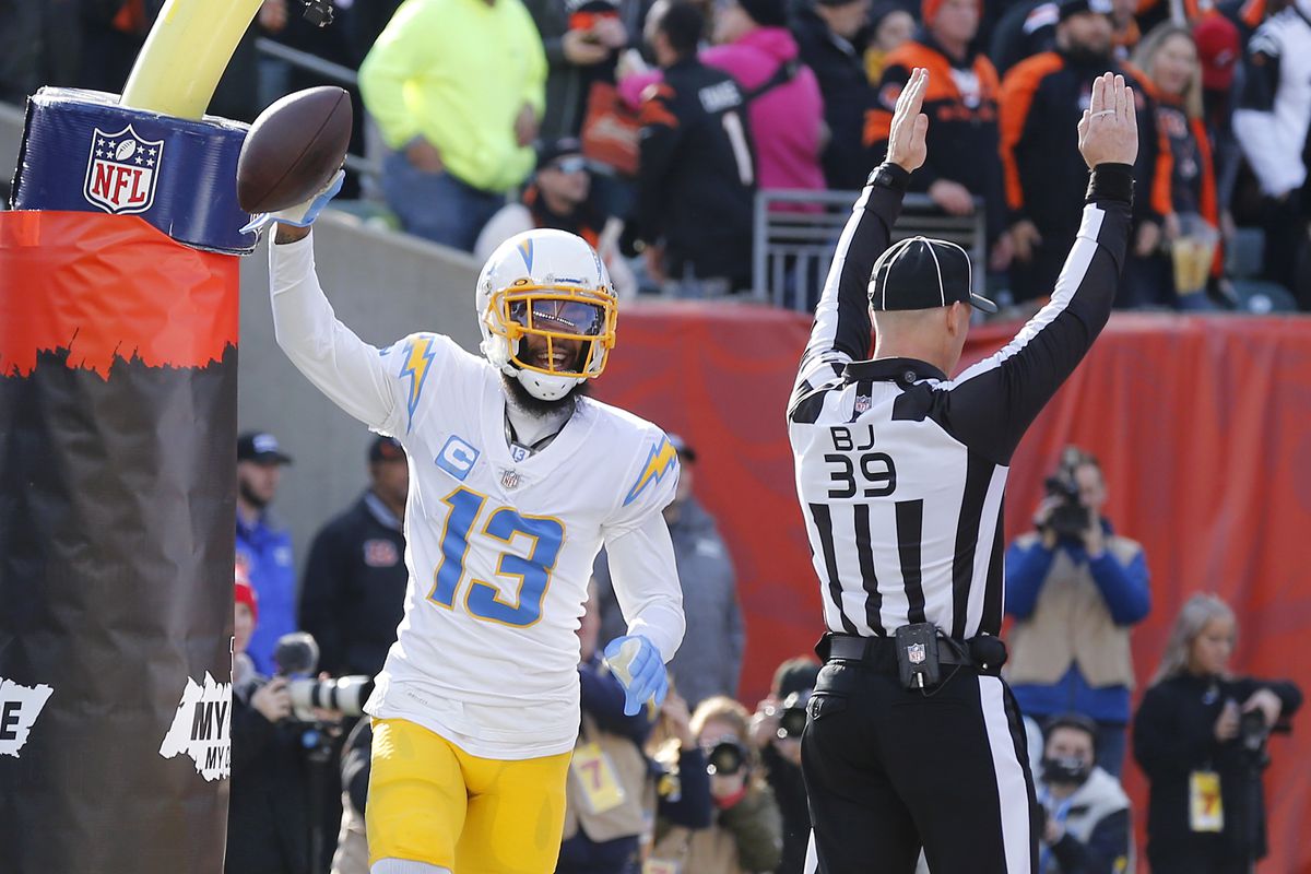 Los Angeles Chargers wide receiver Keenan Allen (13) celebrates the touchdown catch during the first quarter against the Cincinnati Bengals at Paul Brown Stadium.