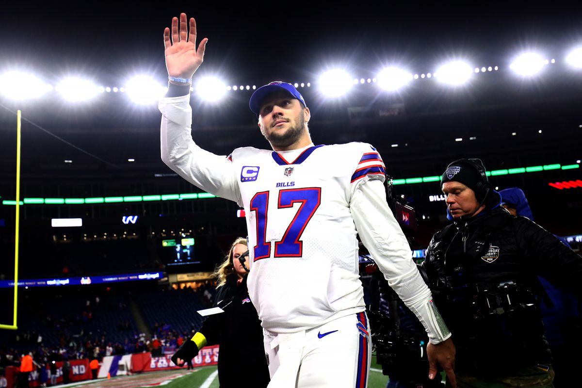 Quarterback Josh Allen #17 of the Buffalo Bills waves to fans following the Bills win over the New England Patriots at Gillette Stadium on December 01, 2022 in Foxborough, Massachusetts.