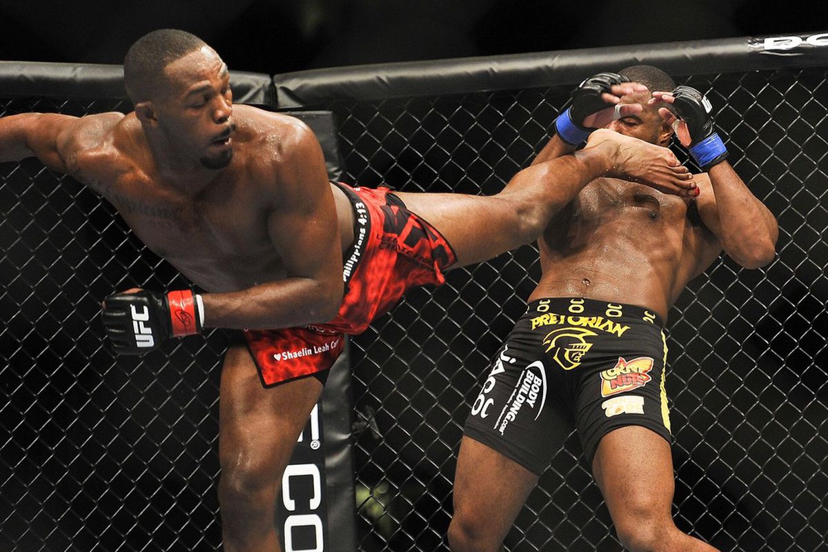 Apr 21, 2012; Atlanta, GA, USA; Jon Jones (left) fights Rashad Evans in the main event and light heavyweight title bout during UFC 145 at Philips Arena. Mandatory Credit: Paul Abell-US PRESSWIRE