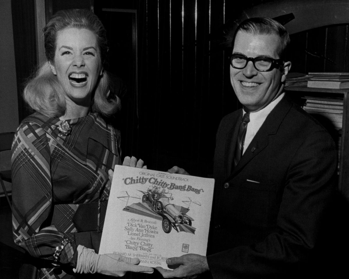 In this 1968 file photo, actress Sally Ann Howes, co-star of the new musical film “Chitty Chitty Bang Bang,” and McCormick Chicago Boys Club director, Tom Moore, get together to talk about the McCormick Chicago Boys Club opening night benefit screening of the film. 