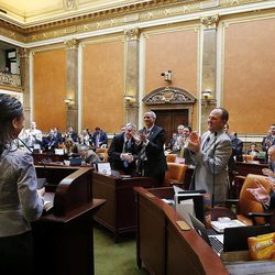 State representatives applaud as Rep. Mia Love, R-Utah, addresses the Utah House of Representatives in Salt Lake City, Wednesday, Feb. 18, 2015. 