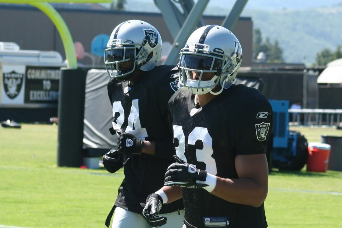 Oakland Raiders safeties Michael Huff and Tyvon Branch at 2011 training camp (photo by Levi Damien)