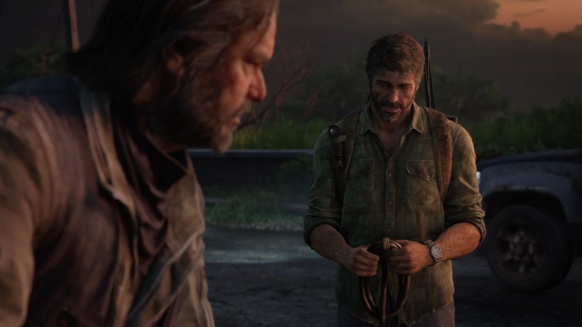 Bill giving Joel the siphon hose at the end of the Bill’s Town chapter in The Last of Us Part 1