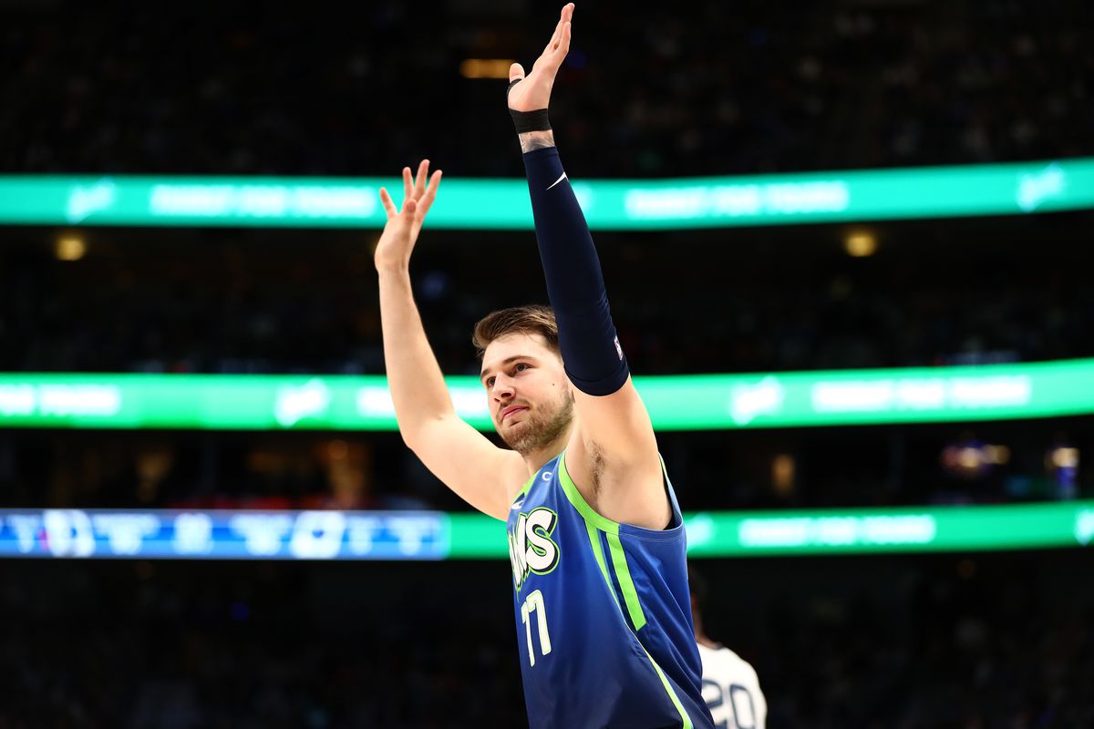 Dallas Mavericks guard Luka Doncic celebrates after a three point basket in the third quarter against the Memphis Grizzlies at the American Airlines Center.