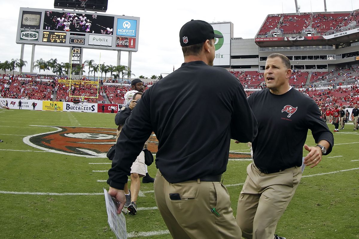 Jim Harbaugh and Greg Schiano, in a game the 49ers won 33-14