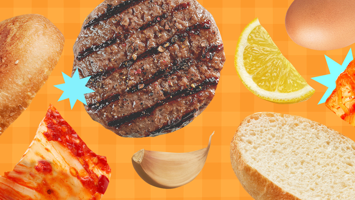 A burger patty, lemon wedge, garlic clove, kimchi, and burger bun are displayed in an illustrated collage. 