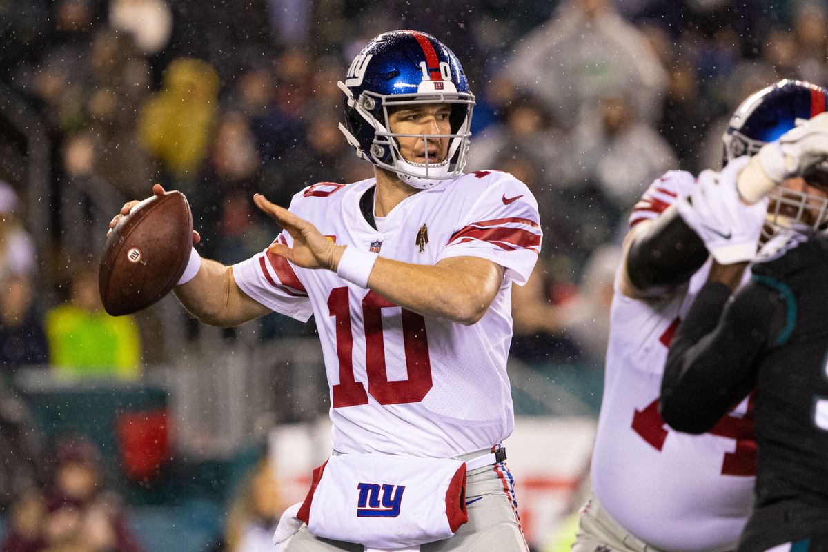 New York Giants quarterback Eli Manning passes the ball against the Philadelphia Eagles during the first quarter at Lincoln Financial Field.