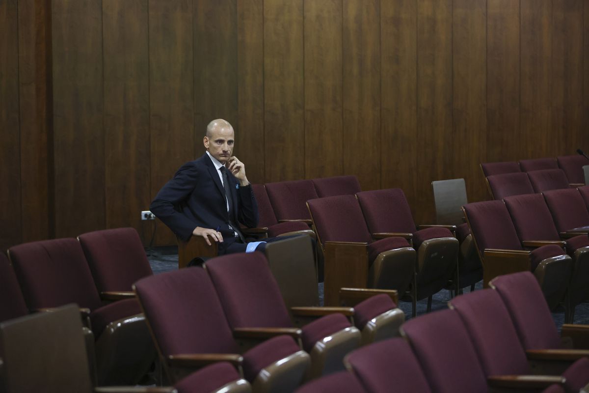 Ald. James M. Gardiner (45th) takes a seat after apologizing to the City Council on Sept. 14.