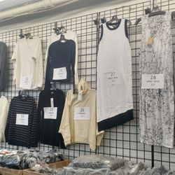 Tops and dresses, priced as marked