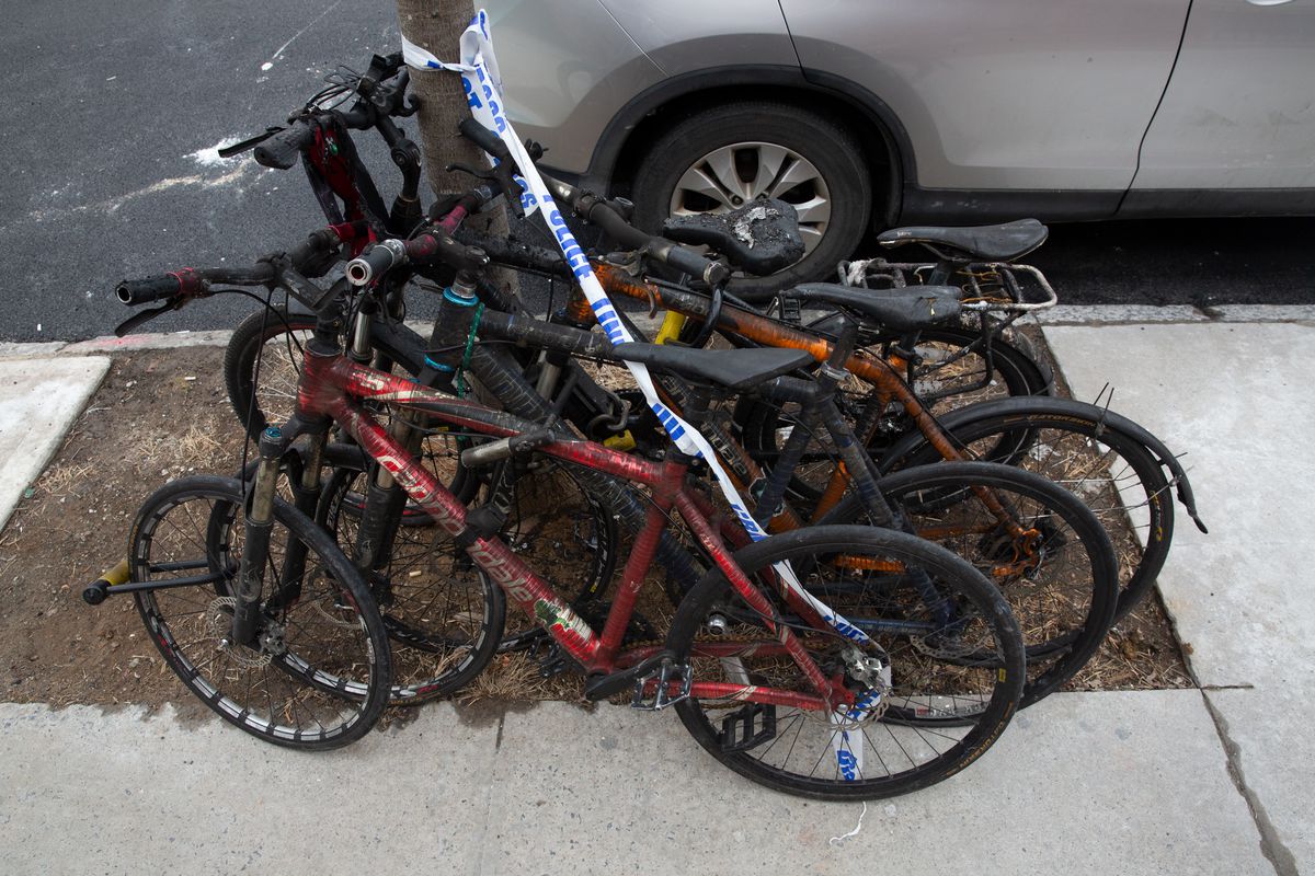 Charred bikes outside the scene of the fire in southern Brooklyn, Jan 27, 2021. 