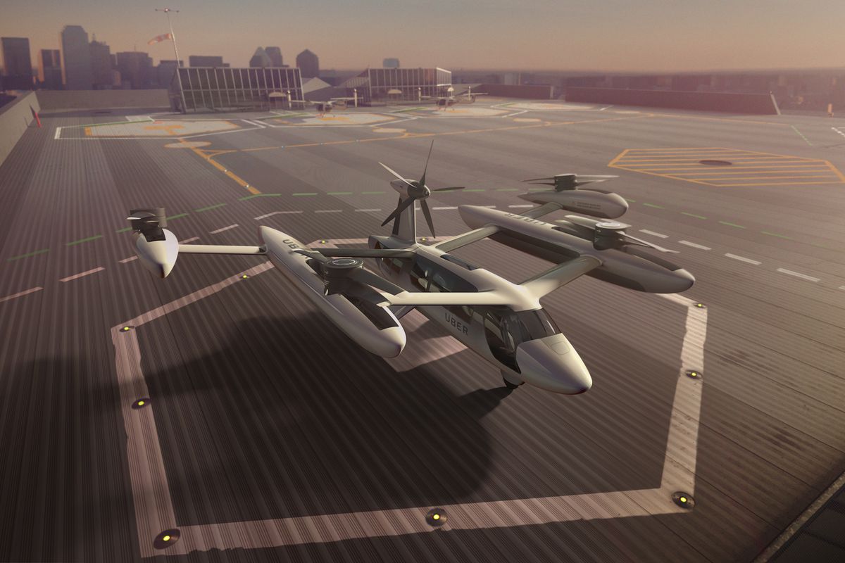 A concept design for a flying car shows a vehicle that looks like a large drone parked on a hexagonal landing tarmac.