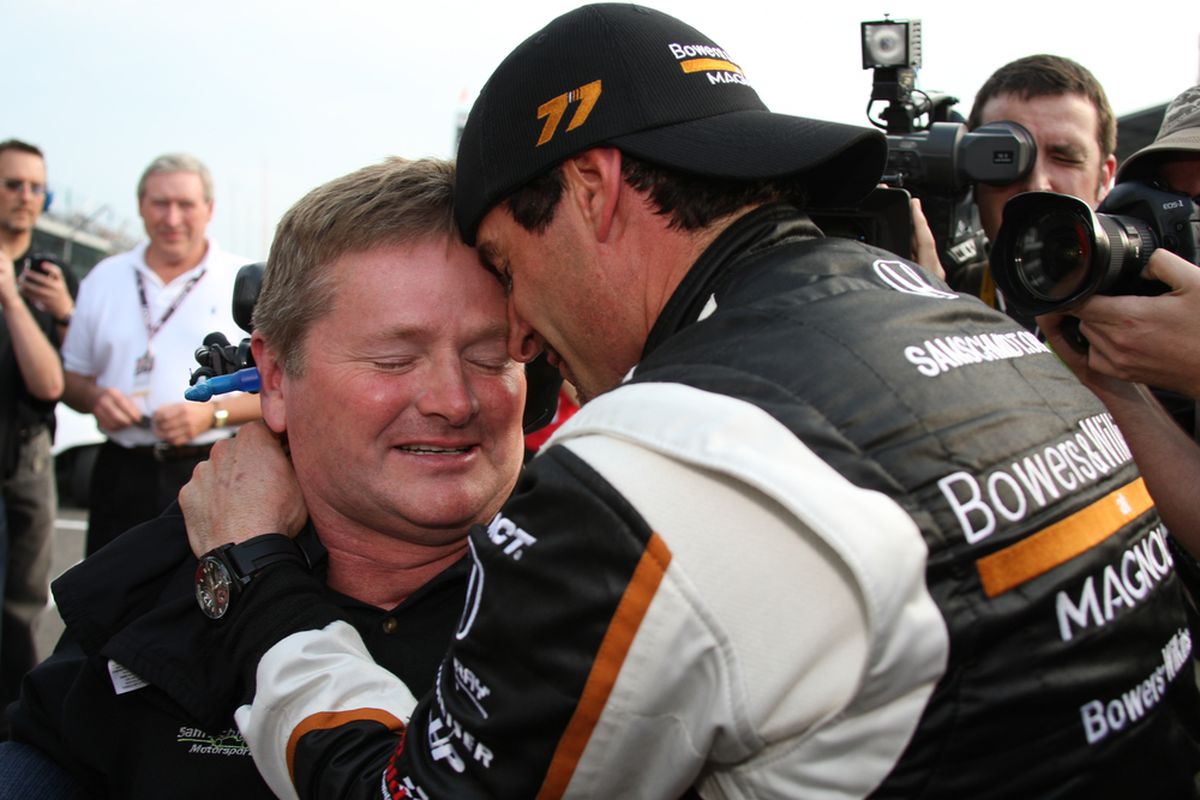 Alex Tagliani (R) celebrates with team owner Sam Schmidt (L) after winning pole position for the 100th Anniversary Indianapolis 500 on May 21, 2011. (Photo: IndyCar)
