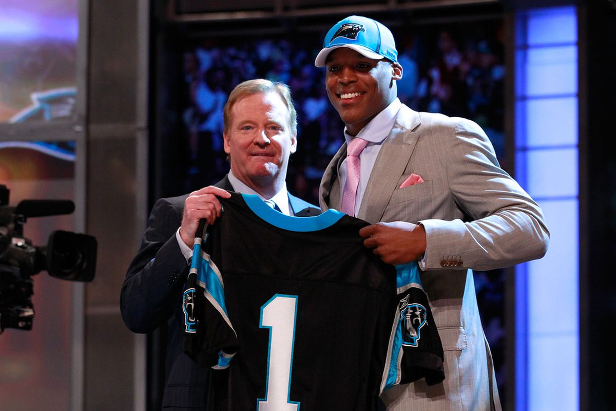 Cam Newton, seen posing with the truly beloved and deeply respected NFL Commissioner and Inventor of Made Up Penalties, Roger Goodell, threw off the mocks last year. How different will it be in 2012?