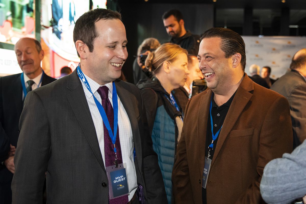 State Rep. Bob Rita (right) chats with Marcus Fruchter, administrator of the Illinois Gaming Board, at the opening of the Rivers Casino sportsbook March 9.