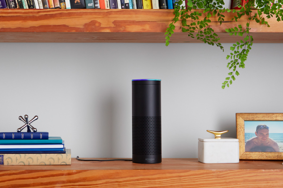 The black Amazon Echo speaker on a shelf