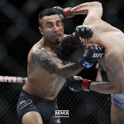 Matthew Lopez lands a right hand on Alejandro Perez at UFC on FOX 29 on Saturday at Gila River Arena in Glendale, Ariz.