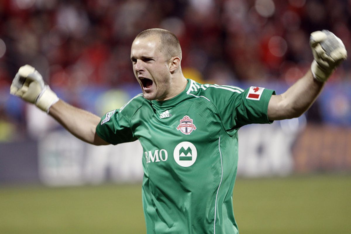 Frei's back.  Now if only we could see such an elegant understated, traditional dark green goalie jersey again.