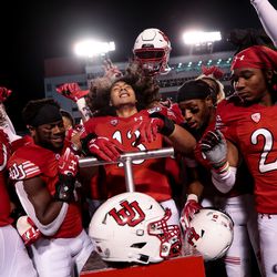 Utah Utes players celebrate their 38-13 win over the Washington State Cougars at Rice-Eccles Stadium in Salt Lake City on Saturday, Sept. 28, 2019.