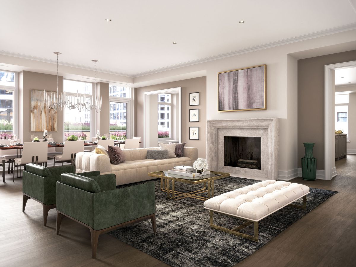 A rendering shows a luxury living room with two leather club chairs facing a marble fireplace, an adjacent upholstered white couch, and a dining room table with an expensive looking glass chandelier near three windows.