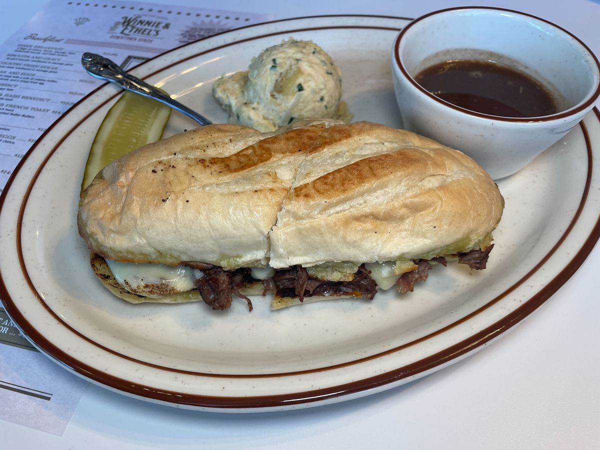 A Pot roast French dip and jus.