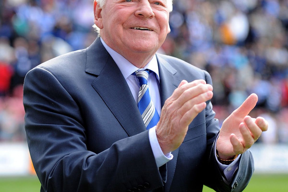 Wigan Athletic owner Dave Whelan applauds the supporters following the Barclays Premier League match between Wigan Athletic and Wolverhampton Wanderers at DW Stadium.