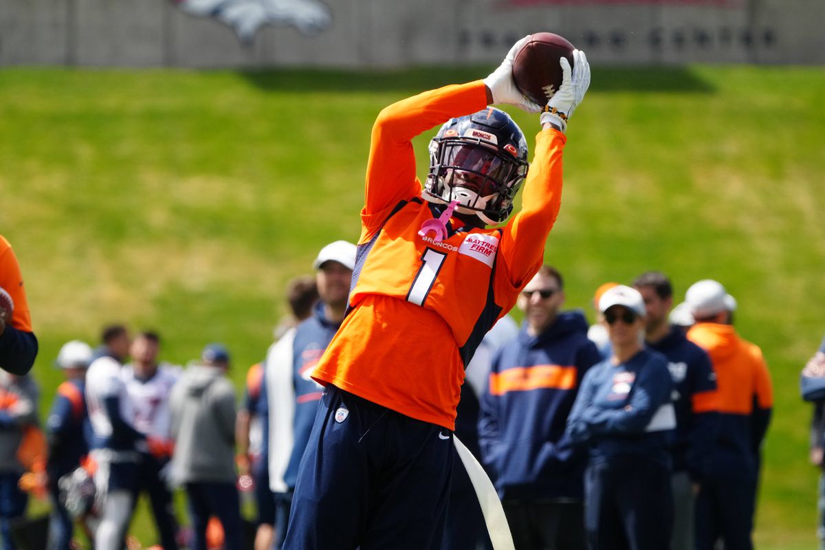 Denver Broncos wide receiver KJ Hamler (1) works out during a Denver Broncos mini camp at UCHealth Training Center.