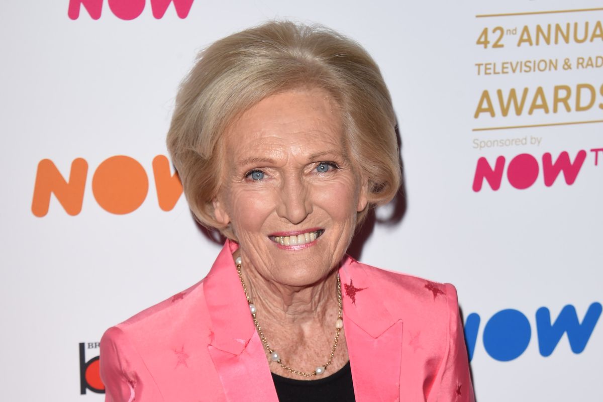 Mary Berry attending an awards show in a pink suit