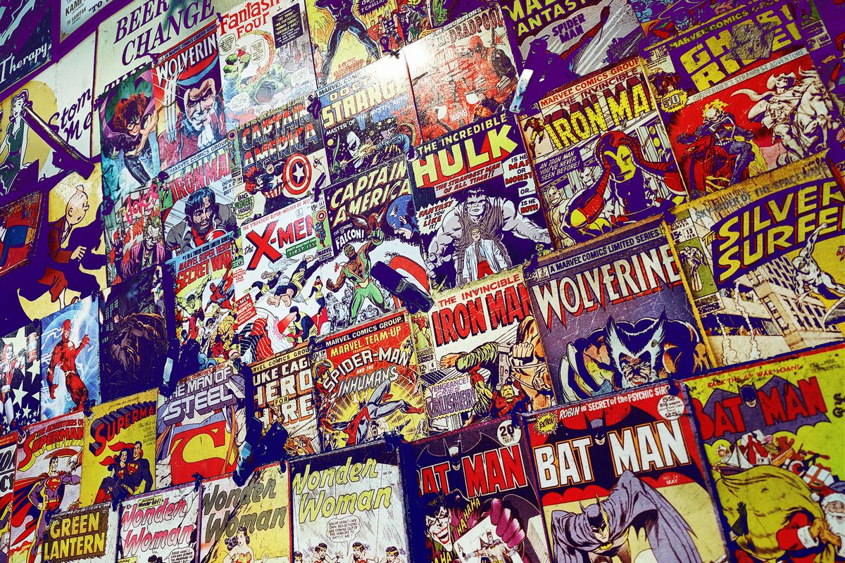 A wall of comics in a comic book store