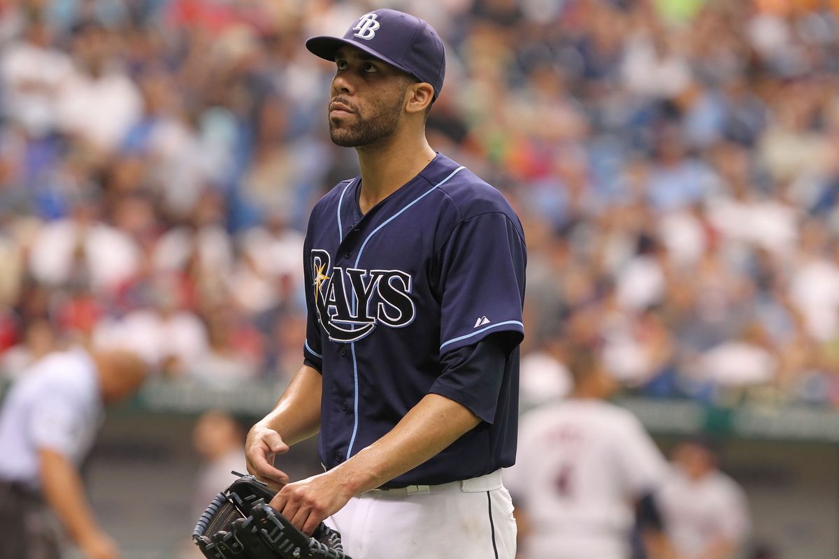July 19, 2012; St. Petersburg, FL, USA; Tampa Bay Rays starting pitcher David Price (14) walks back to the dugout after he pitched the fifth inning against the Cleveland Indians at Tropicana Field. Mandatory Credit: Kim Klement-US PRESSWIRE