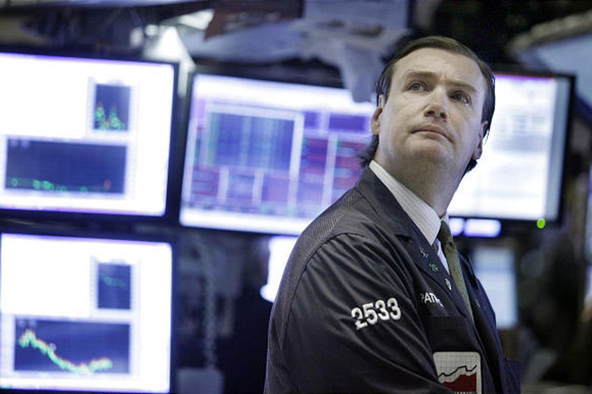 Specialist Patrick King works on the floor of the New York Stock Exchange Thursday.