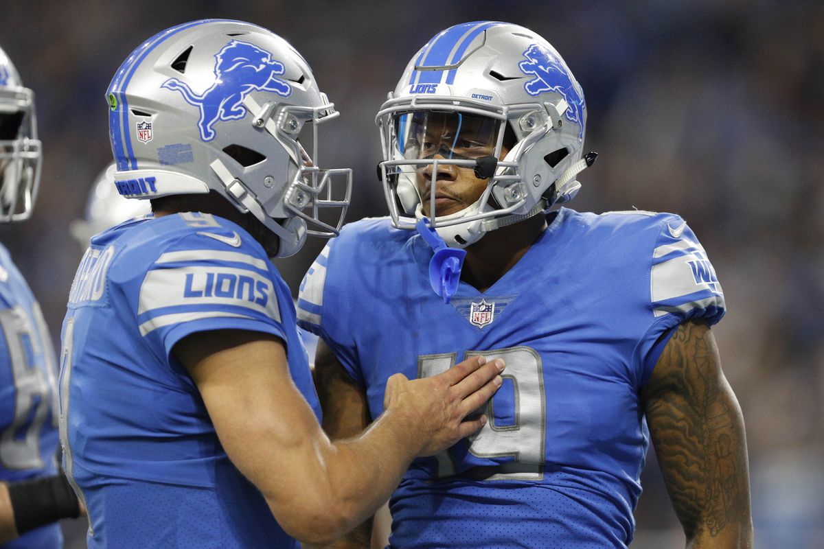 Detroit Lions wide receiver Kenny Golladay celebrates with quarterback Matthew Stafford after combining for a touchdown during the fourth quarter against the Arizona Cardinals at Ford Field.
