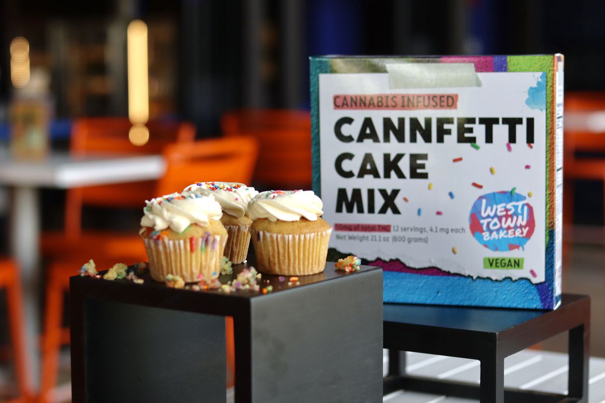 A box of cake mix with cupcakes.