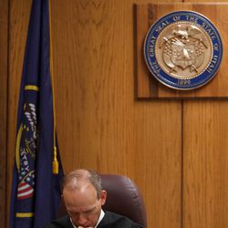 Judge Derek Pullan pauses as the trial for Martin MacNeill continues in 4th District Court in Provo, Thursday, Oct. 31, 2013. MacNeill is accused of murder for allegedly killing his wife, Michele MacNeill, in 2007.