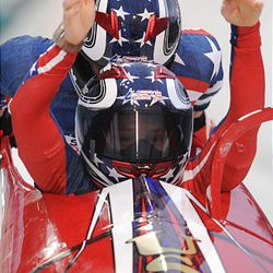 The USA-1 bobsled, piloted by Shauna Rohbock, starts the third heat of the two-man bobsled  Wednesday at the 2010 Winter Olympics in Vancouver.