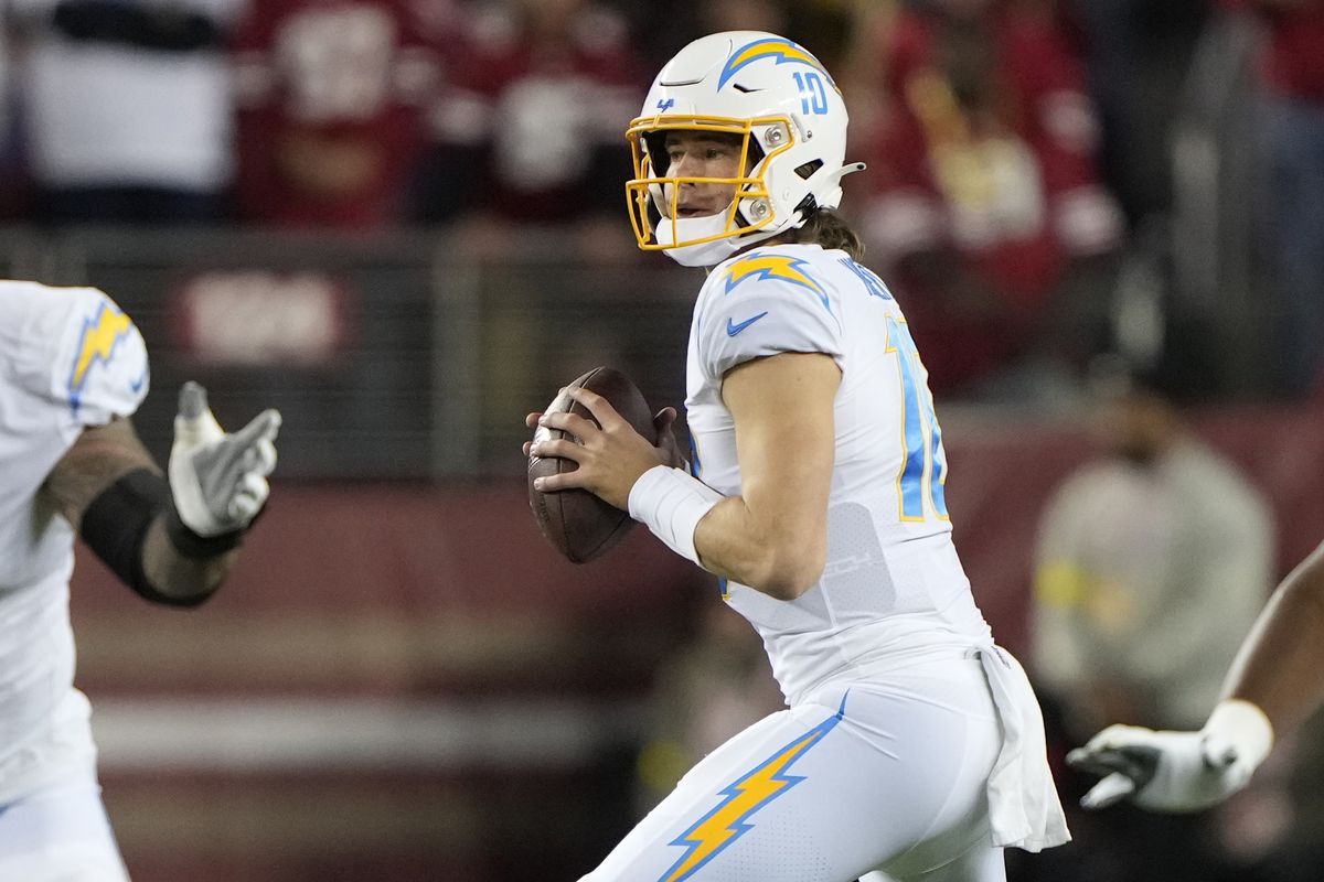 Justin Herbert #10 of the Los Angeles Chargers looks to pass during the first quarter against the San Francisco 49ers at Levi’s Stadium on November 13, 2022 in Santa Clara, California.