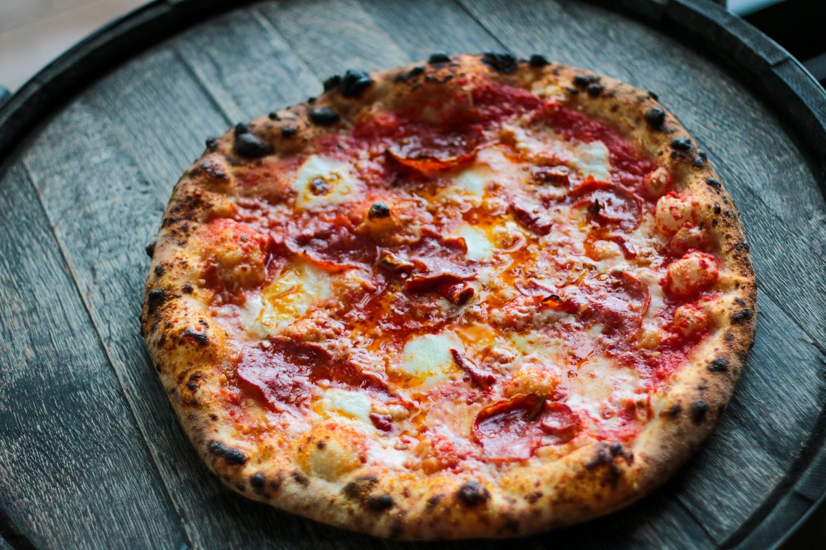 Calabrian pizza with spicy Calabrese salami, Calabrian peppers, and hot chili oil from Monday Night Garage in West End Atlanta.