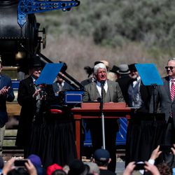 Rep. Rob Bishop, R-Utah, flanked by Sens Mitt Romney and Mike Lee, both R-Utah, Utah Gov. Gary Herbert, U.S. Secretary of the Interior David Bernhardt and U.S. Secretary of Transportation Elaine Chao, left to right, speaks during the Spike 150 celebration at Golden Spike National Historic Park at Promontory Summit on Friday, May 10, 2019.