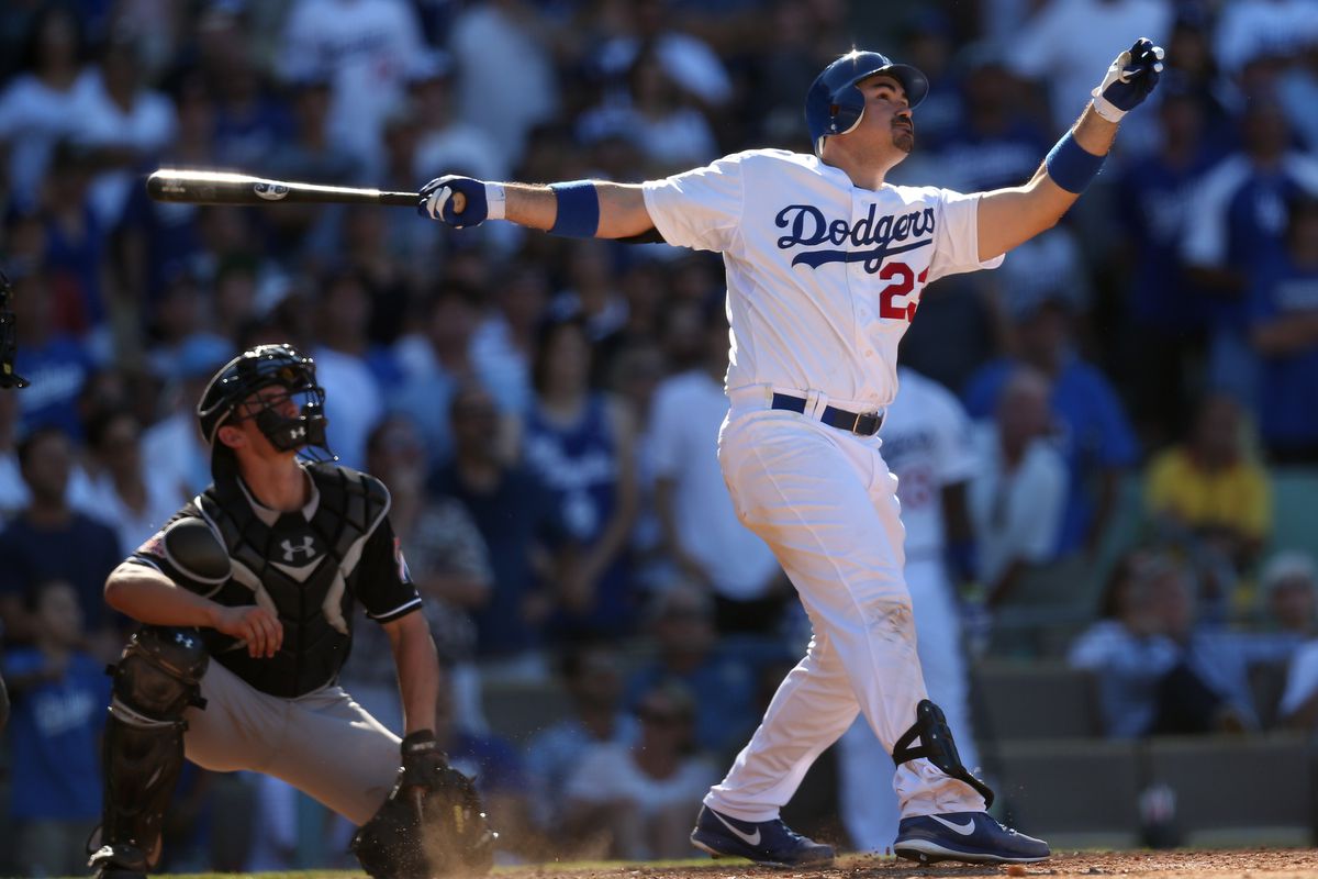 Adrian Gonzalez is now a member of the Los Angeles Dodgers, and he essentially cost them $260 million.  (Photo by Stephen Dunn/Getty Images)