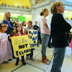 Polygamy advocates voice their support of HB281 at a protest inside the Capitol rotunda Monday, March 7, 2016.
