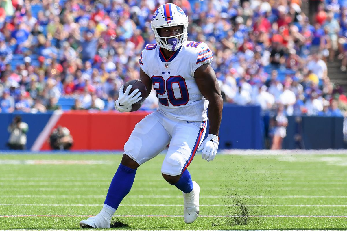 Buffalo Bills running back Zack Moss (20) runs with the ball against the Green Bay Packers during the first half at Highmark Stadium.&nbsp;