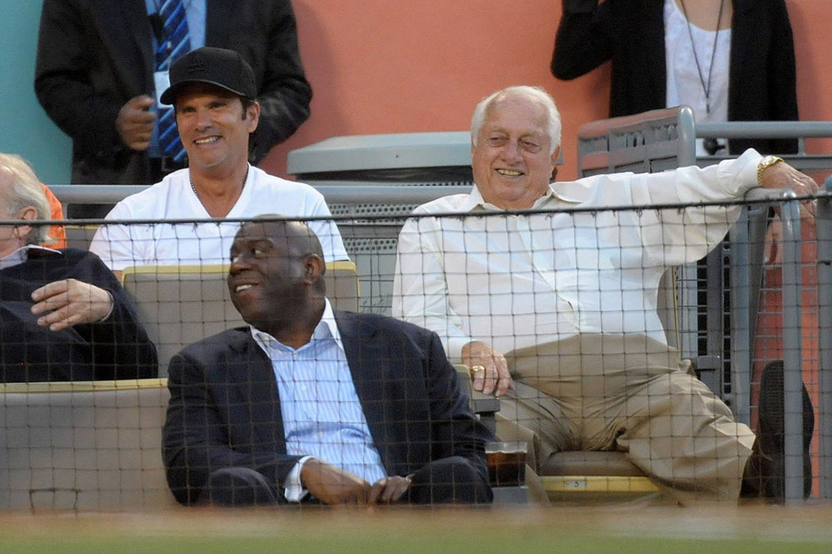 Yes, that's Lorenzo Lamas with Magic Johnson and Tommy Lasorda, Clearly, new ownership is bringing out the celebrities to Dodger Stadium.
