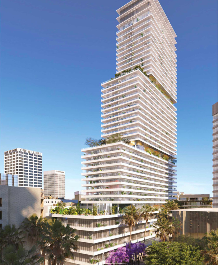 A tall building that has terraces with trees. 