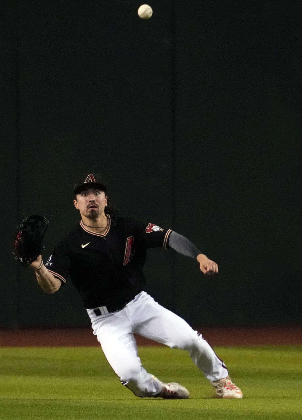 Arizona Diamondbacks left fielder Corbin Carroll (7) is unable to run down a line drive against the Miami Marlins during the fifth inning at Chase Field.