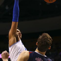 Brigham Young Cougars forward Yoeli Childs (23) dunks the ball against the Saint Mary's Gaels at the Marriott Center in Provo on Thursday, Jan. 24, 2019.