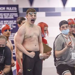 Swimmer celebrates after swimming in men’s 200-yard freestyle relay at the 6A Swimming State Championships at Brigham Young University in Provo on Saturday, Feb. 19, 2022.