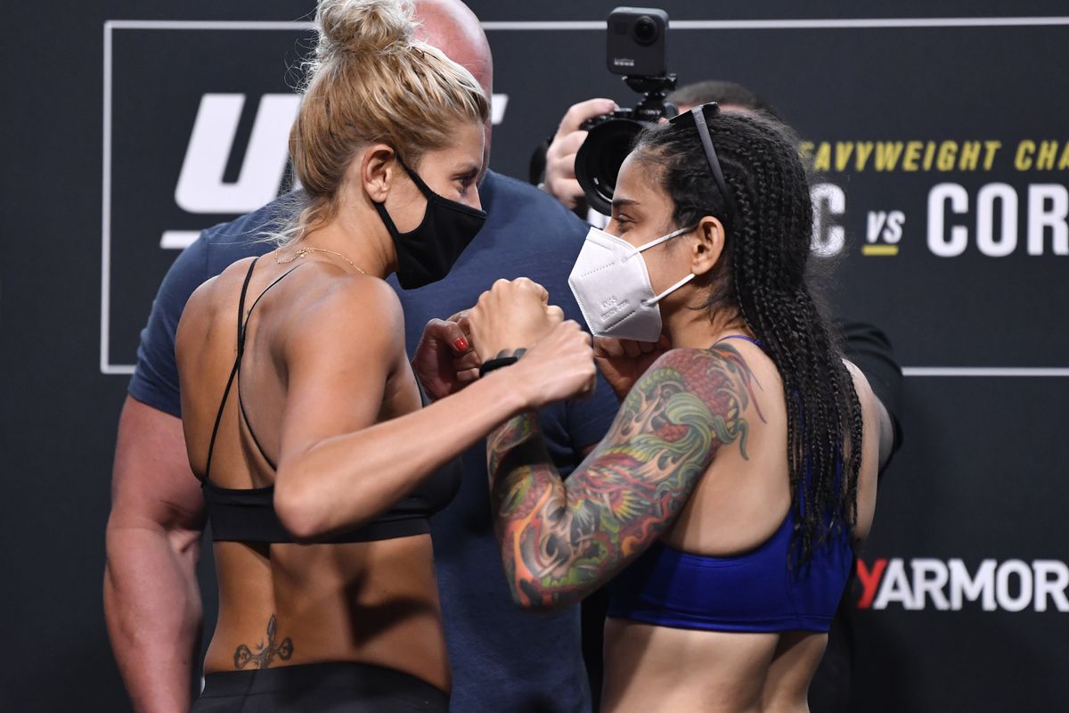 Opponents Ashley Yoder and Livinha Souza of Brazil face off during the UFC 252 weigh-in at UFC APEX on August 14, 2020 in Las Vegas, Nevada.