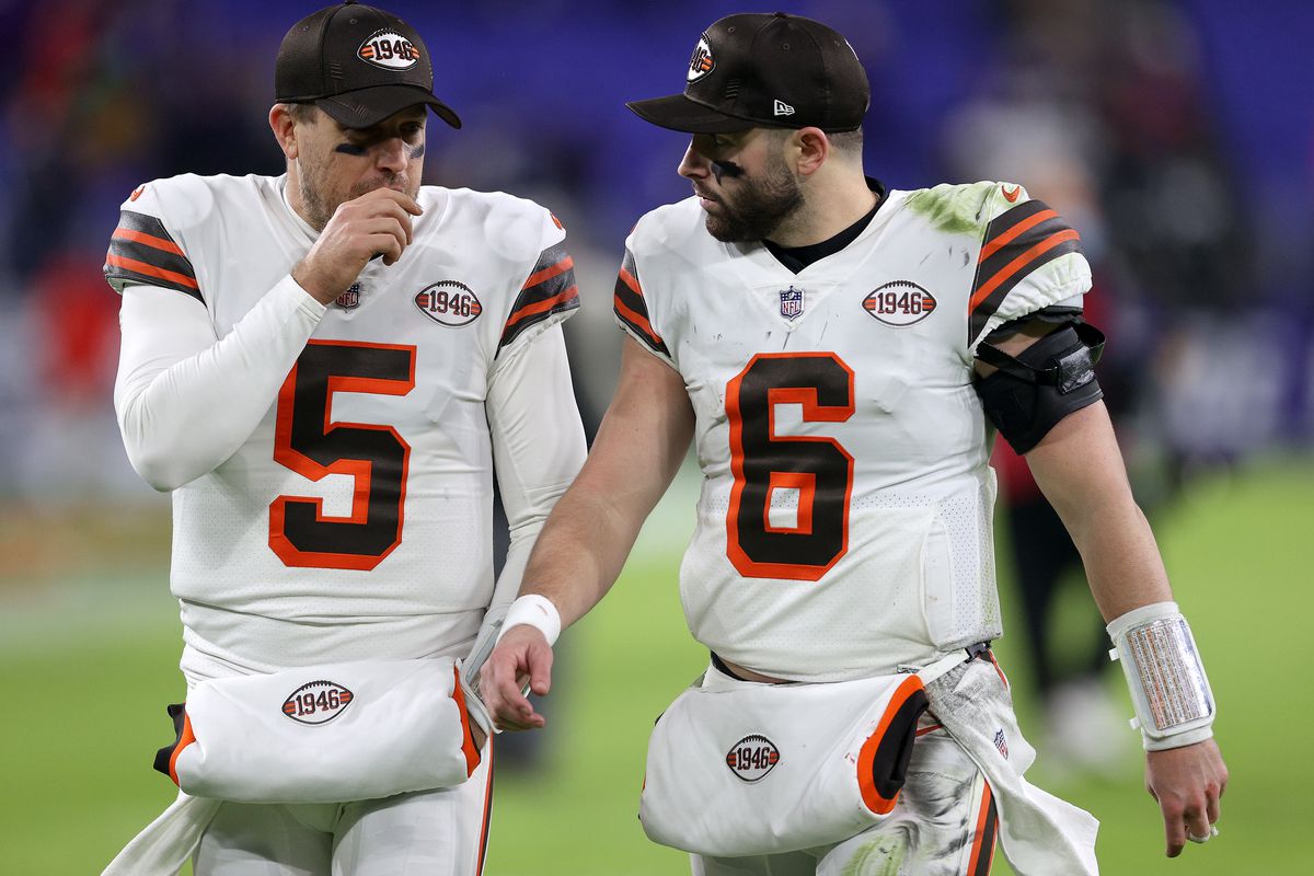 Quarterbacks Case Keenum #5 and Baker Mayfield #6 of the Cleveland Browns walk off the field following the Browns loss to the Baltimore Ravens at M&amp;T Bank Stadium on November 28, 2021 in Baltimore, Maryland.